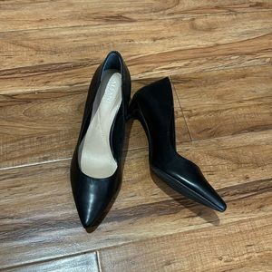 Black leather pumps